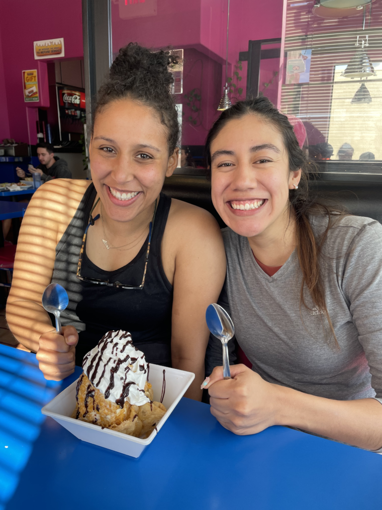 Sele & Maya eating dessert
