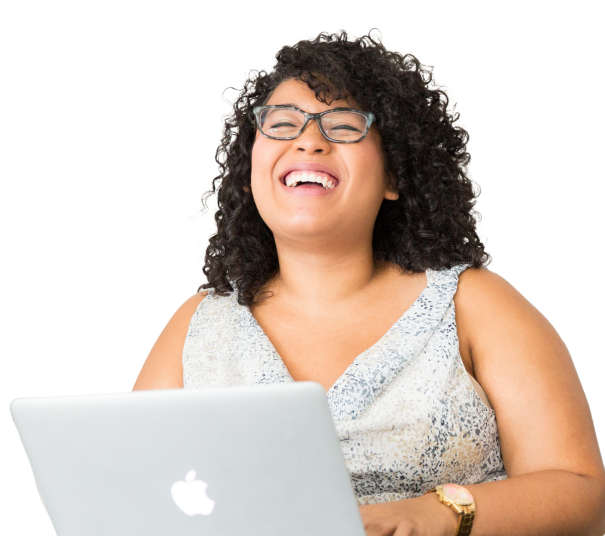 woman holding laptop and laughing